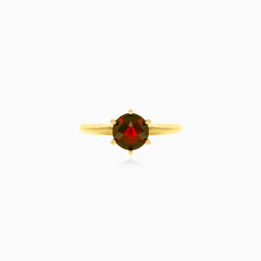 Sophisticated round fine step cut garnet ring