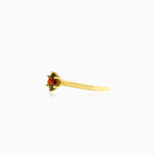 Sophisticated round fine step cut garnet ring