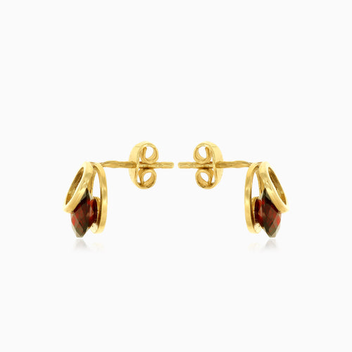 Eclipse tension round garnet stud earrings