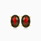 Garnet oval stud earrings in 14kt yellow gold