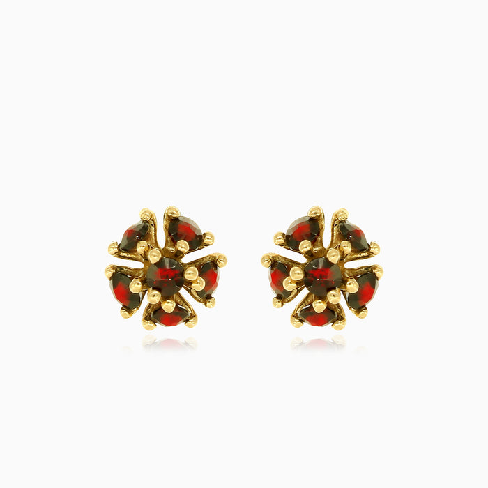 Stylish garnet stud earrings in 14kt gold