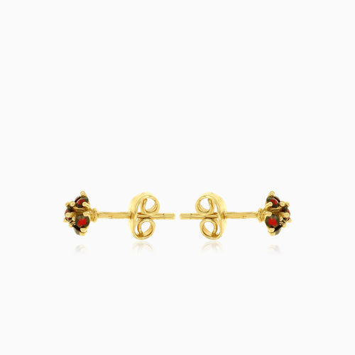 Stylish garnet stud earrings in 14kt gold
