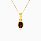 Garnet oval pendant in yellow gold