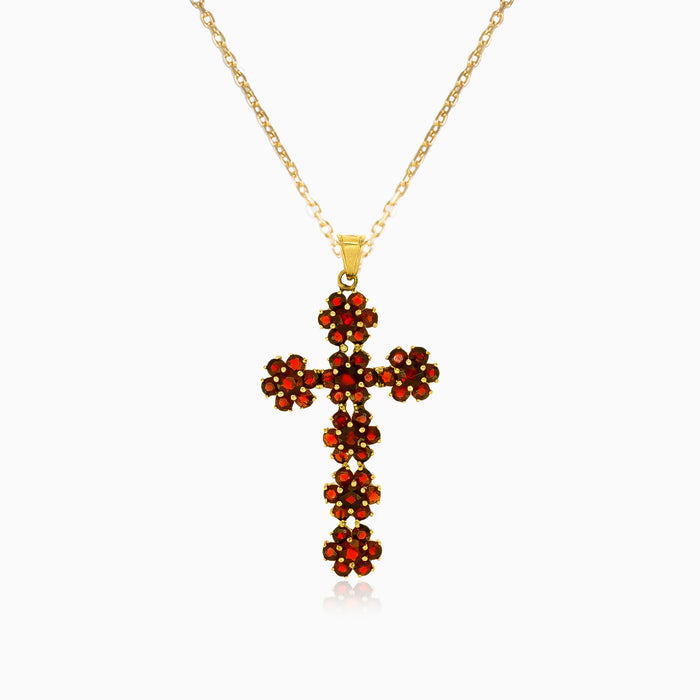 Fine step cut garnet cross