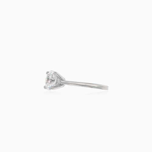 Four prong set silver ring