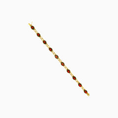 Luxuriöses Armband aus Gold mit Granat und Diamanten