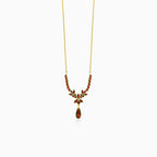 Marquise and pear garnet necklace