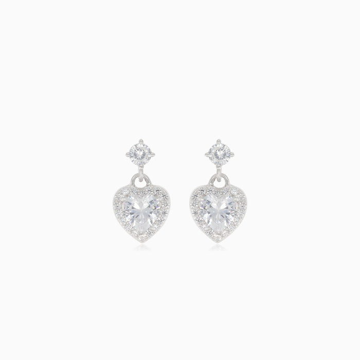 Silver dangling heart stud earrings