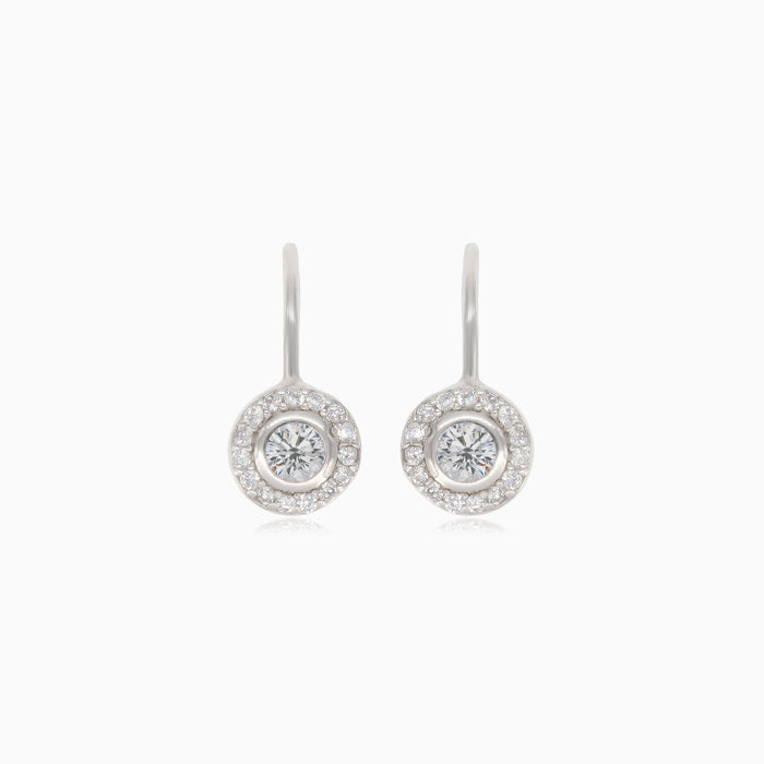 Silver earrings with large cubic zirconia, surrounding smaller cubic zirconia