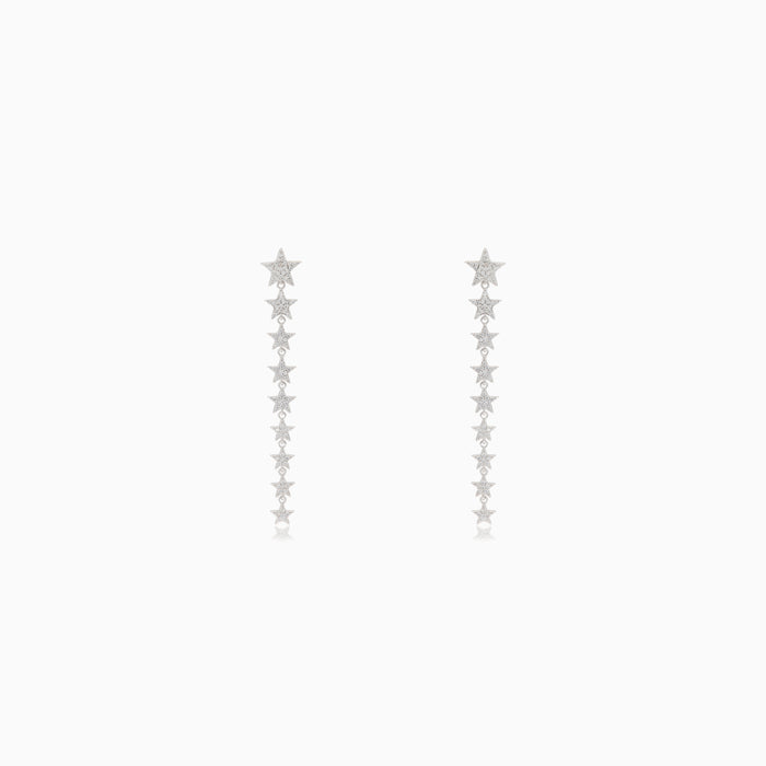 Silver stud earrings with hanging stars