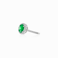 Halo silver ring with emerald and cubic zirconia