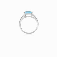 Elegant silver ring with blue topaz