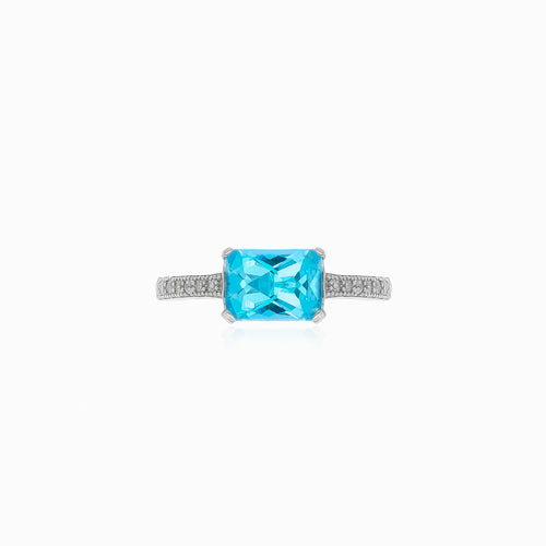 Elegant silver ring with blue topaz