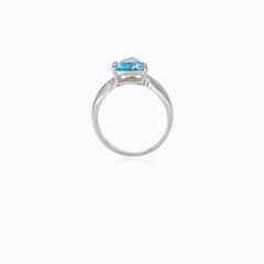 Trilliant blue topaz ring