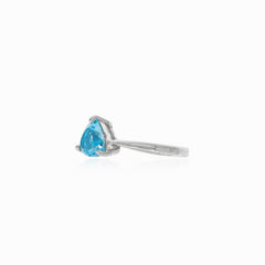 Trilliant blue topaz ring