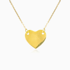 Gold necklace with heart