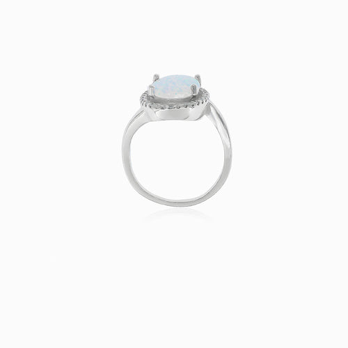 Prong set cubic zirconia and white opal ring