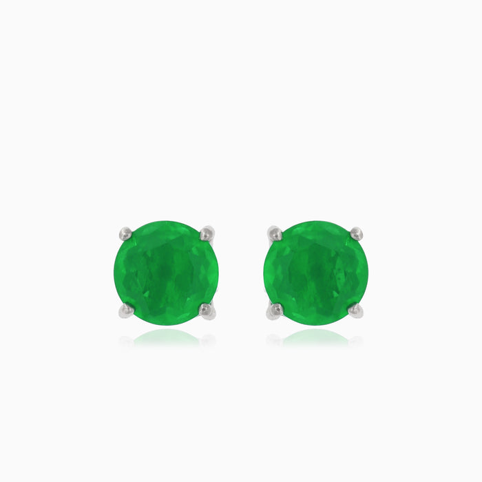 Silver stud earrings with round synthetic emerald