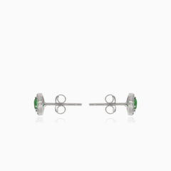 Silver earrings with synthetic emerald and surrounding cubic zirconia