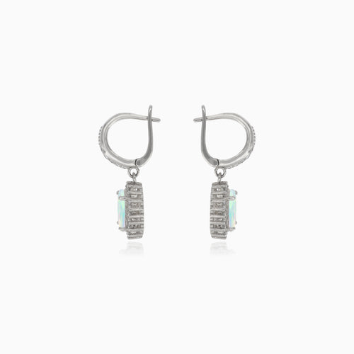 Silver hanging earrings with white opal