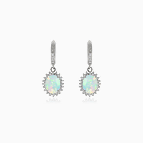 Silver hanging earrings with white opal