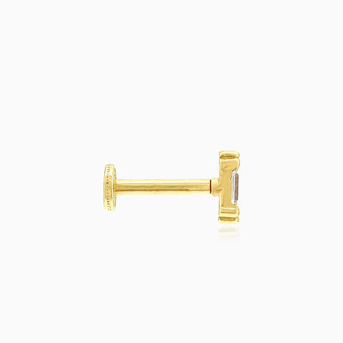 Stylish yellow gold piercing with radiant cut stones