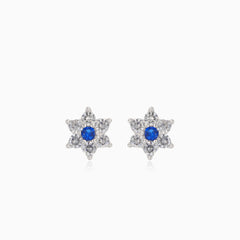 Silver flower earrings with sapphire center