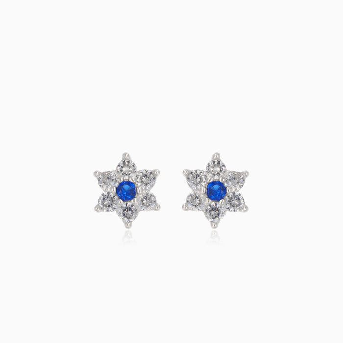 Silver flower earrings with sapphire center