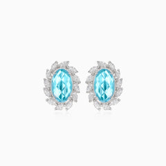 Silver topaz earrings with cubic zirconia around