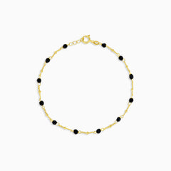 Stylish gold bracelet with black onyx