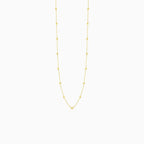 Elegant gold necklace with little balls