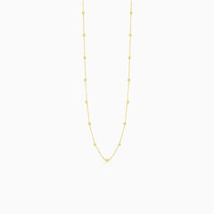 Elegant gold necklace with little balls
