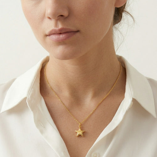 Gold star pendant