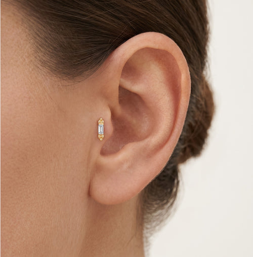 Stilvolles Gelbgold-Piercing mit Radiant-Schliff-Steinen