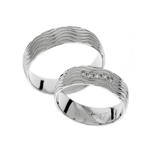 White gold wedding ring with wave design