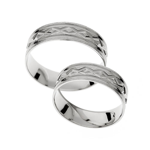 Elegant matte white gold wedding band with polished engraving