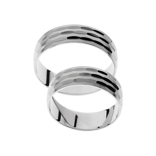 Modern white gold wedding ring with engravings