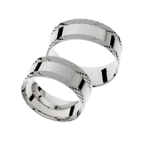 Smooth white gold wedding ring with carved sides