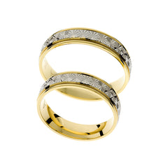 Anillo de boda elegante en oro amarillo y blanco.