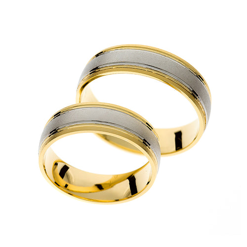 Thick rounded wedding ring in yellow and white gold