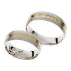 Thick wedding ring in white and yellow gold