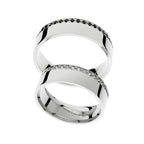 White gold wedding rings with edge set stones