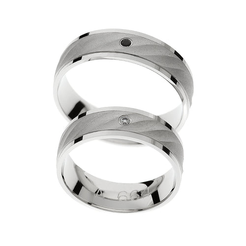 White gold wedding bands with solitaire gems