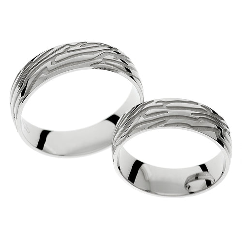 White gold wedding ring with engraved lines