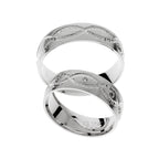 White gold wedding ring with cross carved lines