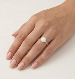 Accent gold white opal ring