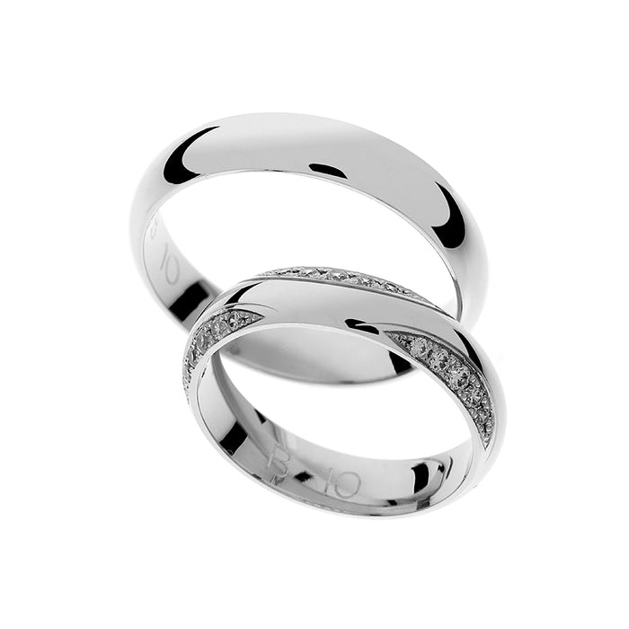 Anillo de boda ancho y elegante de oro blanco