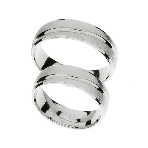 White gold ring with carved line around