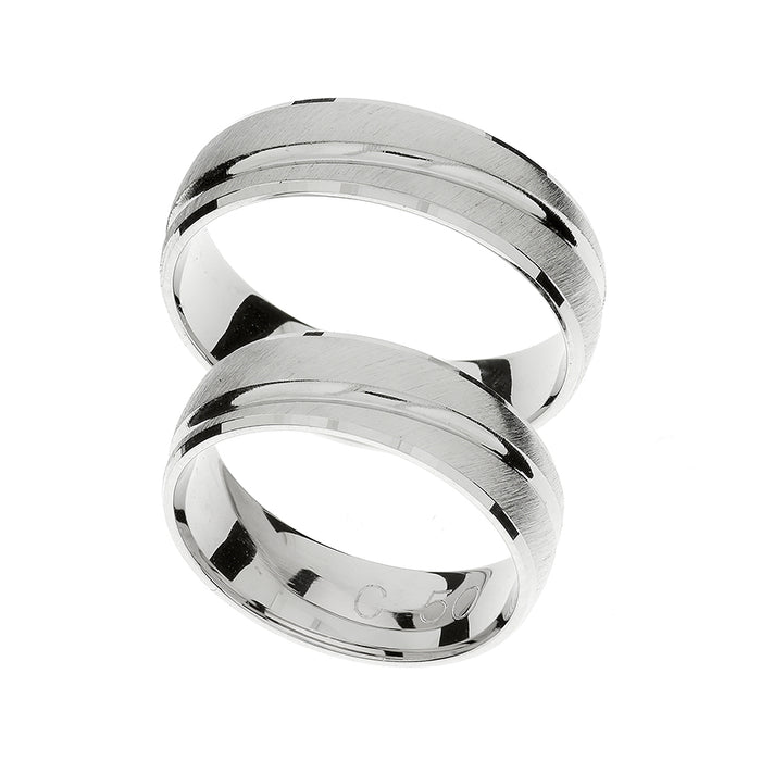 Anillo de oro blanco con línea tallada alrededor