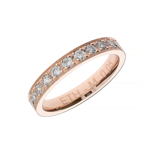 Wide rose gold wedding ring with prong set and stones